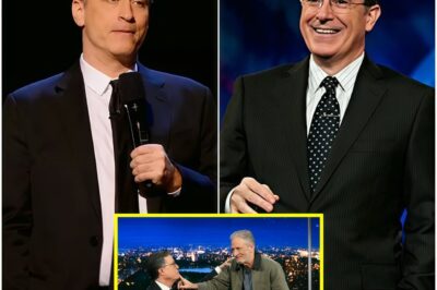 ‘He Opened the Card. And What He Read Wasn’t a Joke — It Was a Fire Alarm’. Jon Stewart ERUPTS After Colbert’s Cancellation — and When He Read the Final Line Aloud, the Studio Didn’t Just Go Silent… Every Camera Froze.